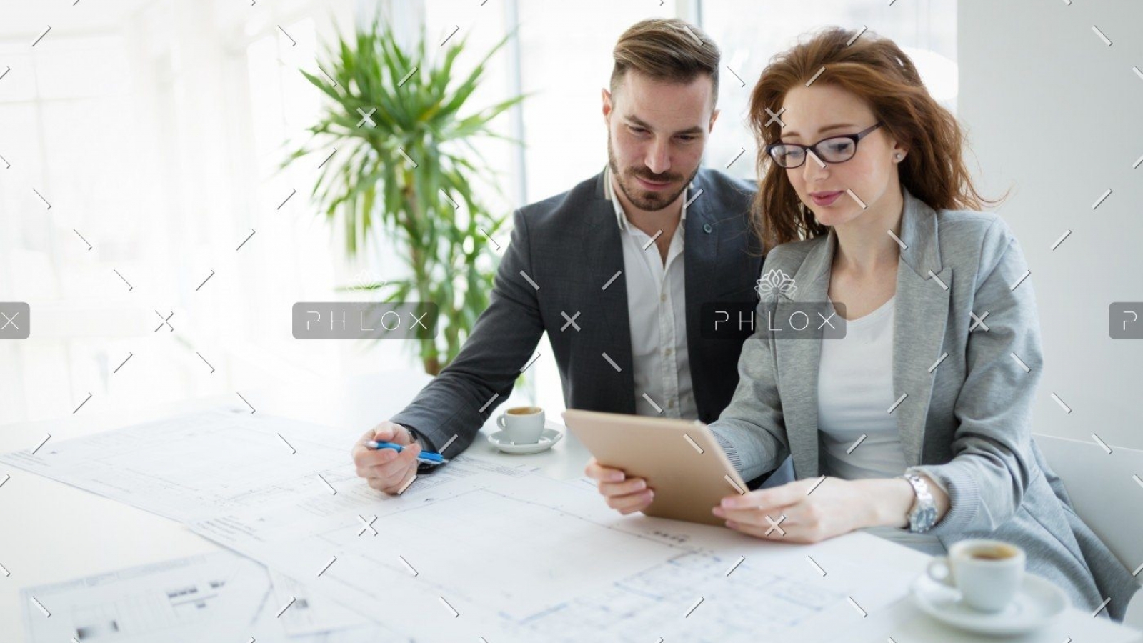 demo-attachment-337-portrait-of-young-architect-woman-on-meeting-KFZCE3A